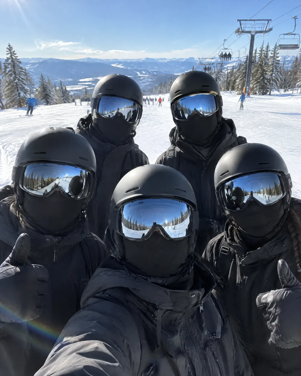 Group photo on the slopes: everyone looks the same